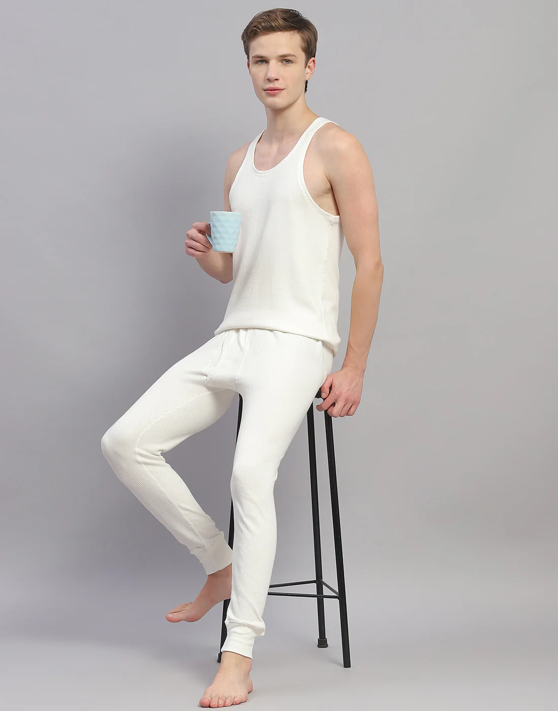 Men Off White Solid Round Neck Sleeveless Thermal Vest